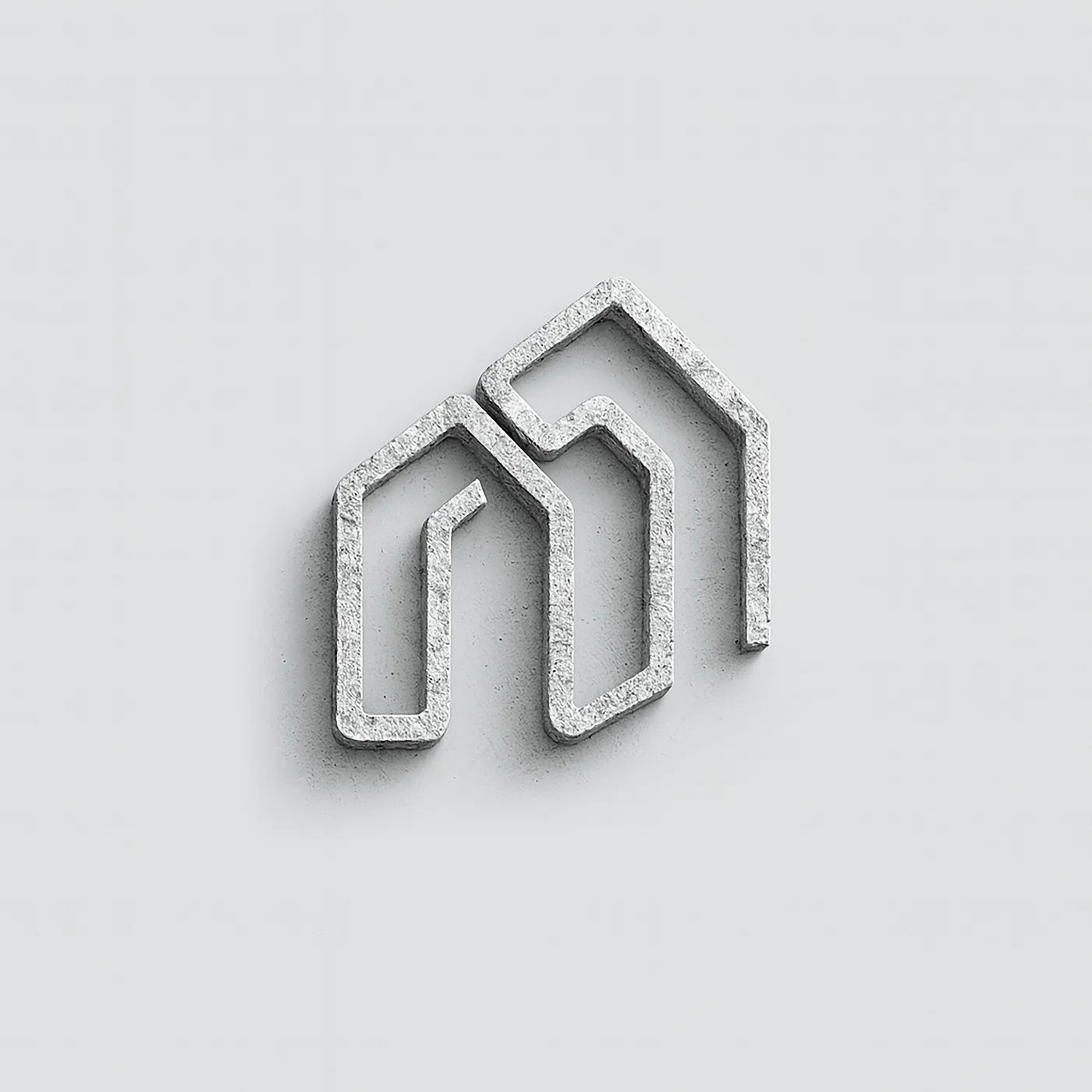 Monogram engraved on a concrete surface
