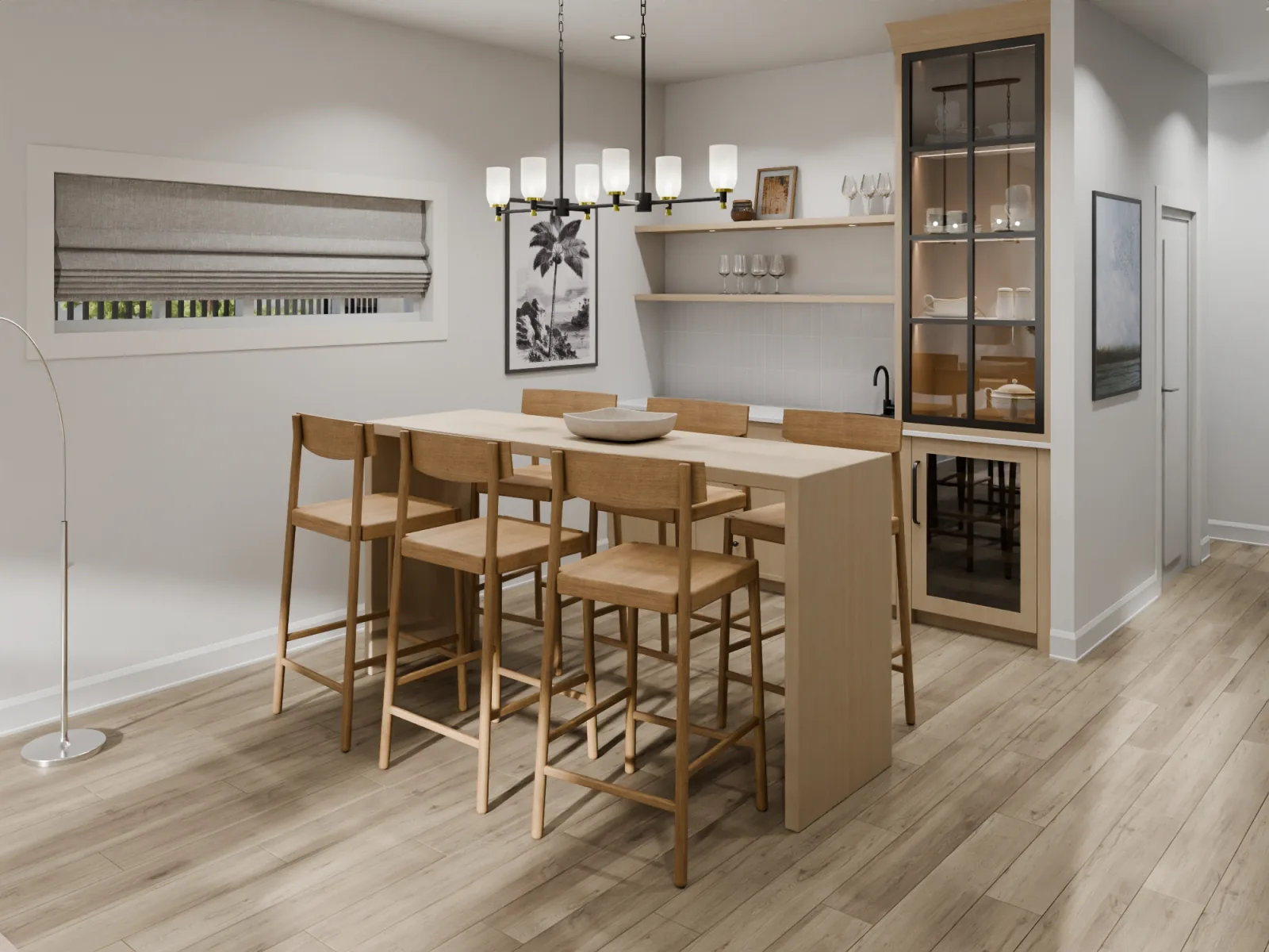 Downstairs, a built-in bar anchors the basement rec room, the space that earns its keep on long evenings, a grace note most new Abbotsford rowhomes never bother with.